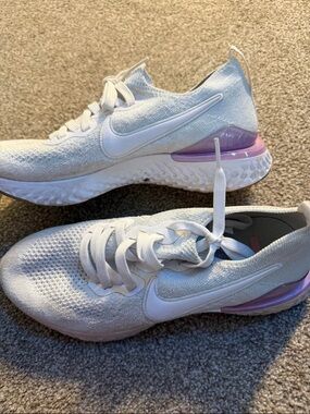 Nike Women’s White Running Shoes with Purple Heel Accent